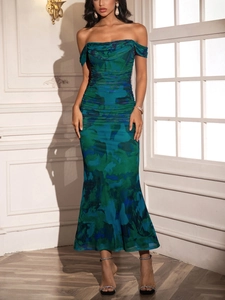 Detail of off-shoulder ruched mesh midi dress with blue-green marble print pattern