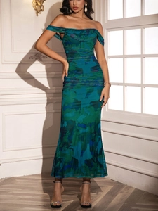 Detailed view of ruched bodycon maxi dress with blue and green marble print