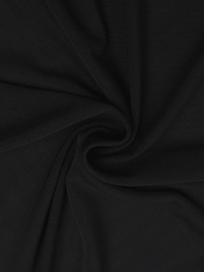 Close-up of the delicate black mesh fabric texture with breathable micro-pore structure