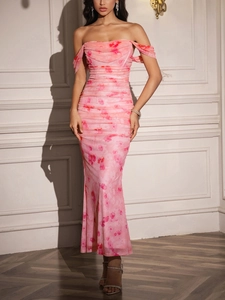 Detail of pink floral mesh dress with elegant shoulder drapes and gathered ruching