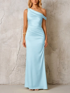 Detail of light blue satin one-shoulder dress with elegant pleats and ruched waistline