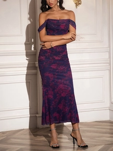 Detail of ruched purple floral maxi dress with off-shoulder neckline and bodycon fit