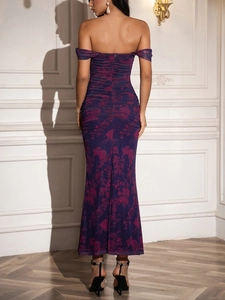 Detail of purple floral off-shoulder dress featuring back ruffles and hidden zipper
