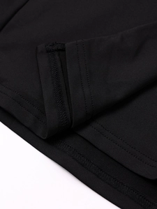 Detail of professional double-needle stitching on high-quality black milk silk fabric