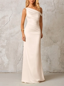 Detail of elegant ivory satin one-shoulder dress showing waist pleats and fabric sheen