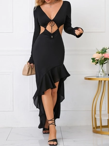 Detailed view of the deep V-neck with lace-up ties and waist cut-outs on a black dress