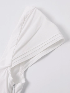 Detailed macro view of white dress fabric texture with fine stitching and hidden zipper