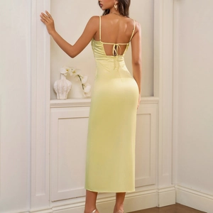 Elegant yellow satin V-neck midi dress featuring backless lace-up detail and slim fit cut