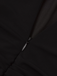 Close-up detail of invisible zipper on black mesh fabric with delicate micro-mesh texture