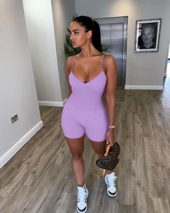 Macro view of lavender ribbed bodycon romper with deep V-neck and thin straps
