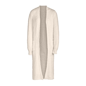 Detail of soft cream plush long cardigan showing fuzzy texture and side pocket design