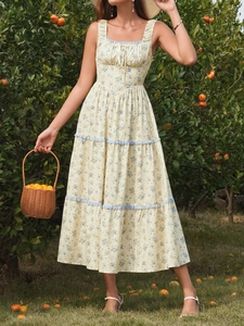 Detailed layered cake skirt hem with delicate blue lace trim and floral print