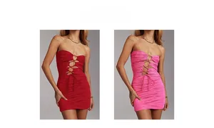 Detail view of lace-up hollow mesh bodycon dress in vibrant red and hot pink colors