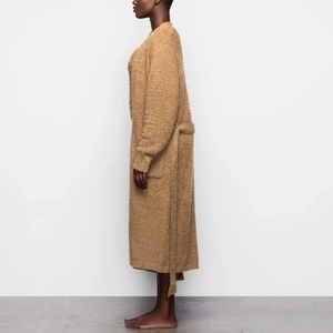 Detail shot of camel bouclé plush robe showing soft texture and belted waist design