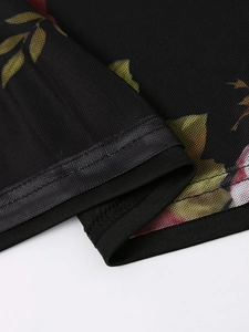 Macro detail of breathable black mesh fabric with realistic floral rose print and stitching