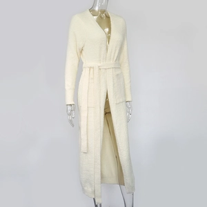 Detail of plush cream fleece robe with adjustable waist tie and large functional pockets