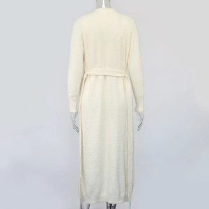Back view of a plush off-white fleece robe featuring a waist tie and cozy knit texture