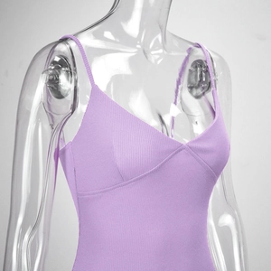 Detail view of lavender ribbed knit fabric and slim fit V-neck strap on a mannequin