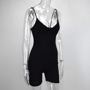 Detail of black ribbed knit bodysuit featuring a deep V-neck and slim shoulder straps