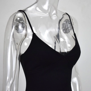 Detail of black ribbed knit bodysuit with slim spaghetti straps and deep V-neckline