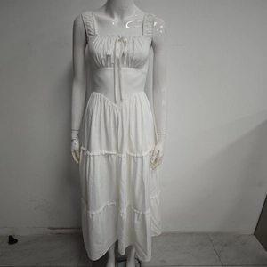 White square neck tiered maxi dress with lace trim and elegant ruffled straps