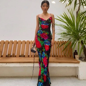 Slim fit black floral maxi dress with spaghetti straps and draped neckline for summer