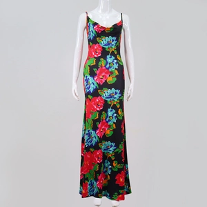 Detail view of tropical floral print maxi dress featuring a cowl neck and slim fit