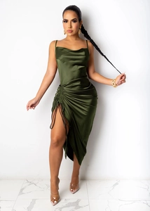 Detail of olive green satin dress featuring a draped cowl neck and thin spaghetti straps
