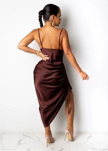 Detailed back view of a satin brown slip dress featuring side drawstring and high slit
