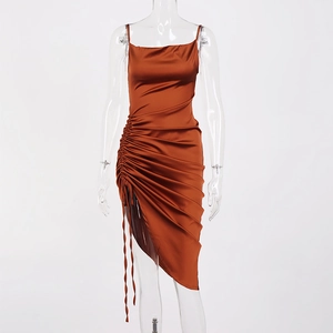 Detail of caramel satin midi dress showing adjustable drawstring ruching and silk texture