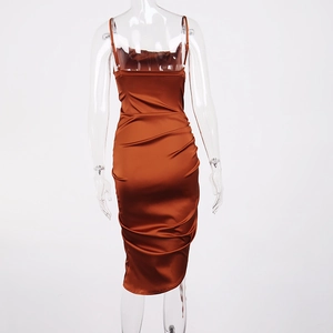 Detail view of the bronze satin maxi dress showing back tie and side ruching texture