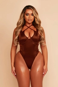 Detail of a dark brown satin bodysuit featuring cross-halter straps and ruched bodice