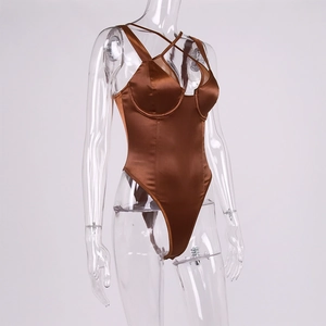 Detail view of brown satin bodysuit showing cross-back straps and underwire cups