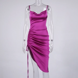 Detail of fuchsia satin dress showing draped cowl neck and ruched drawstring slit