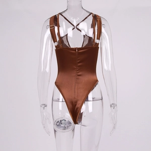 Detail view of brown satin bodysuit showing cross back straps and adjustable buckles