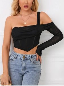 Detail of black corset top with mesh sleeve and asymmetrical boning design