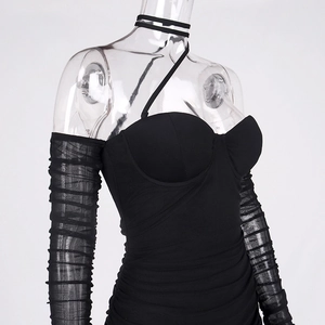 Detail of black mesh bodycon dress featuring pleated sheer sleeves and halter neckline