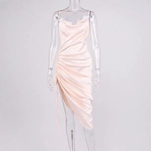 Detail of light pink satin dress showing side drawstring ruching and silk texture
