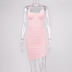 Detail of pink mesh mini dress featuring corset boning and ruched bodycon design