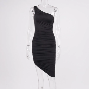 Detail of black one-shoulder ruched dress showing side draping and asymmetrical hem