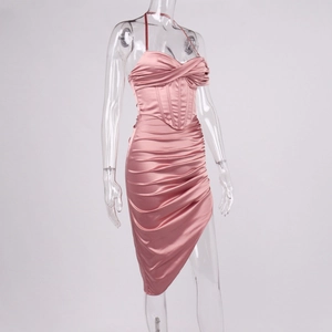 Detail of pink satin corset dress with ruched bodice, halter neck and boning structure