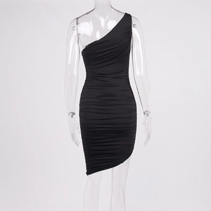 Detailed view of the black ruched fabric and asymmetric hem on this one-shoulder dress
