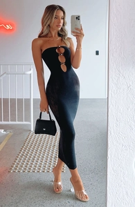 Detail of black strapless midi dress featuring cutout bodice and rhinestone bow accents