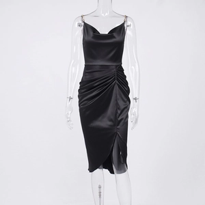 Detail of cowl neck black satin dress with adjustable straps and metal ring buckles