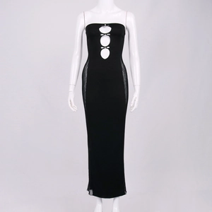 Detail of black strapless tube dress featuring cut-out rhinestone bows and mesh side panels