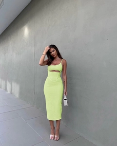 Detail of neon green corset midi dress showing fishbone structure and waist cut-outs
