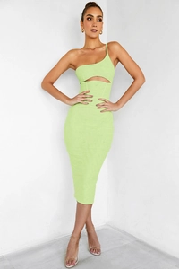 Detail of lime green one-shoulder dress featuring waist cut-out and bodycon fit
