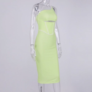 Detail view of lime green one-shoulder dress with hollow out chest and waist boning