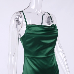 Elegant dark green satin slip dress with cowl neck and side slit detail for formal events
