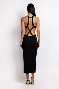 Rear view of elegant backless halter maxi dress with crisscross straps and slim fit design